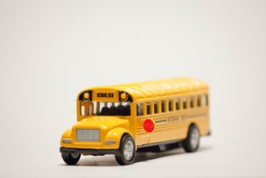yellow school bus on white background